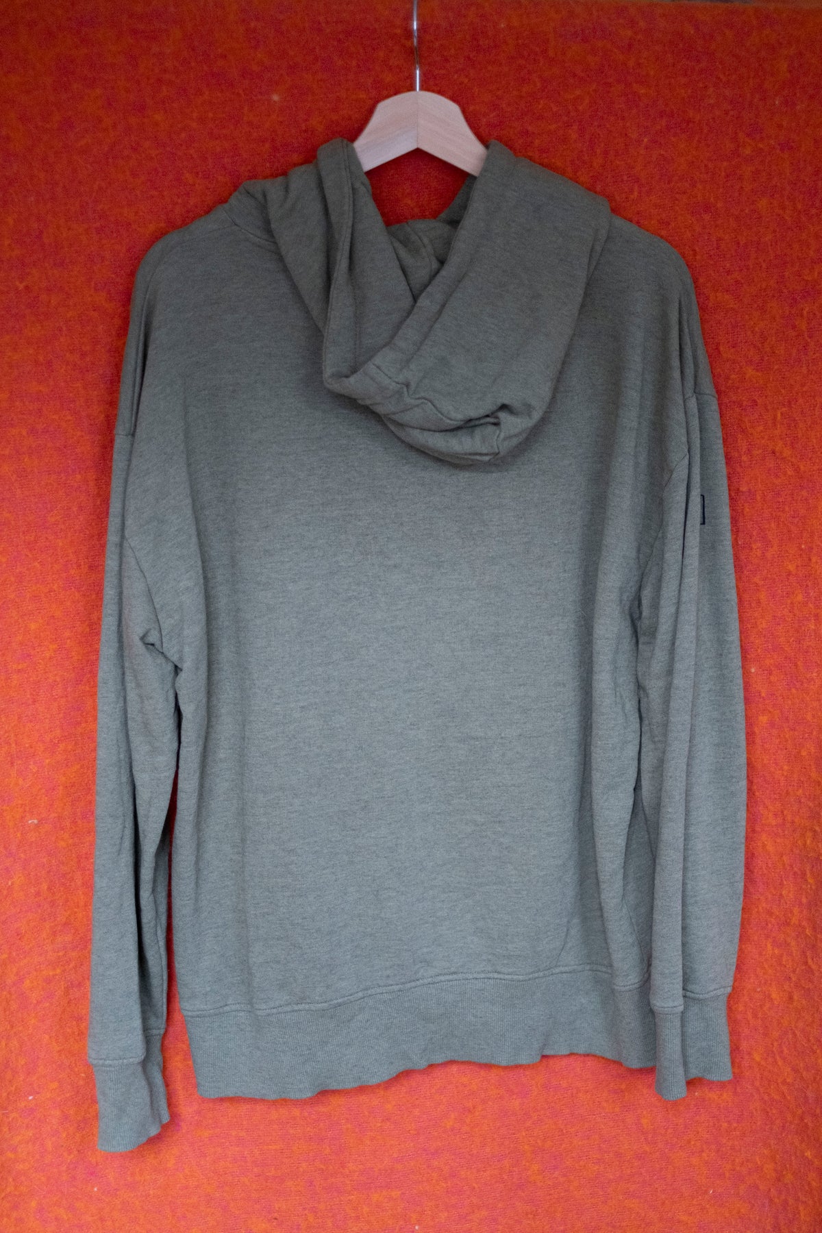 a big one: green hoodie, M